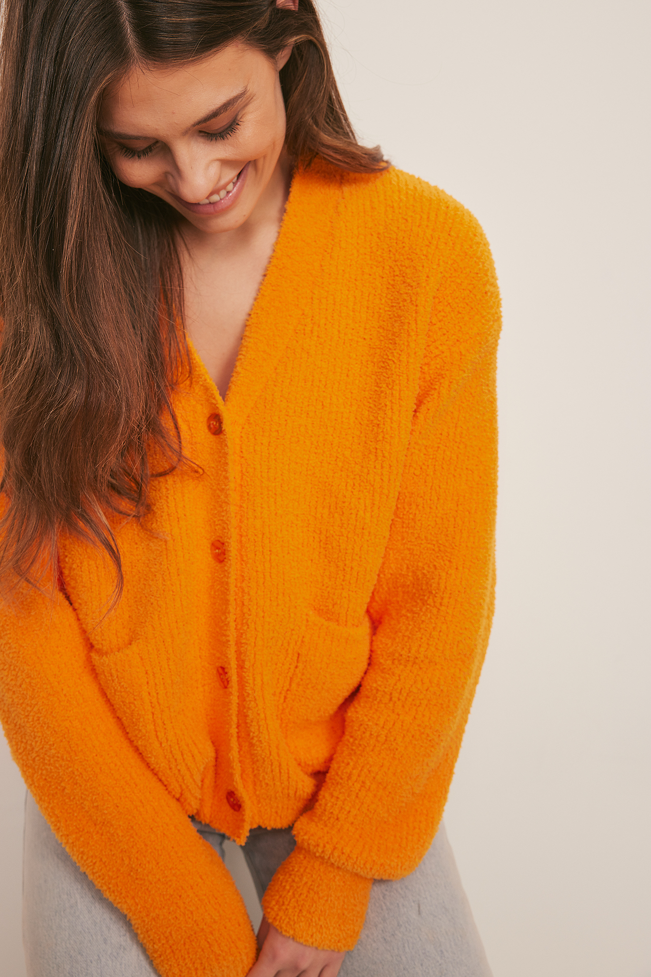 Orange Cardigan en tricot duveteux à poche