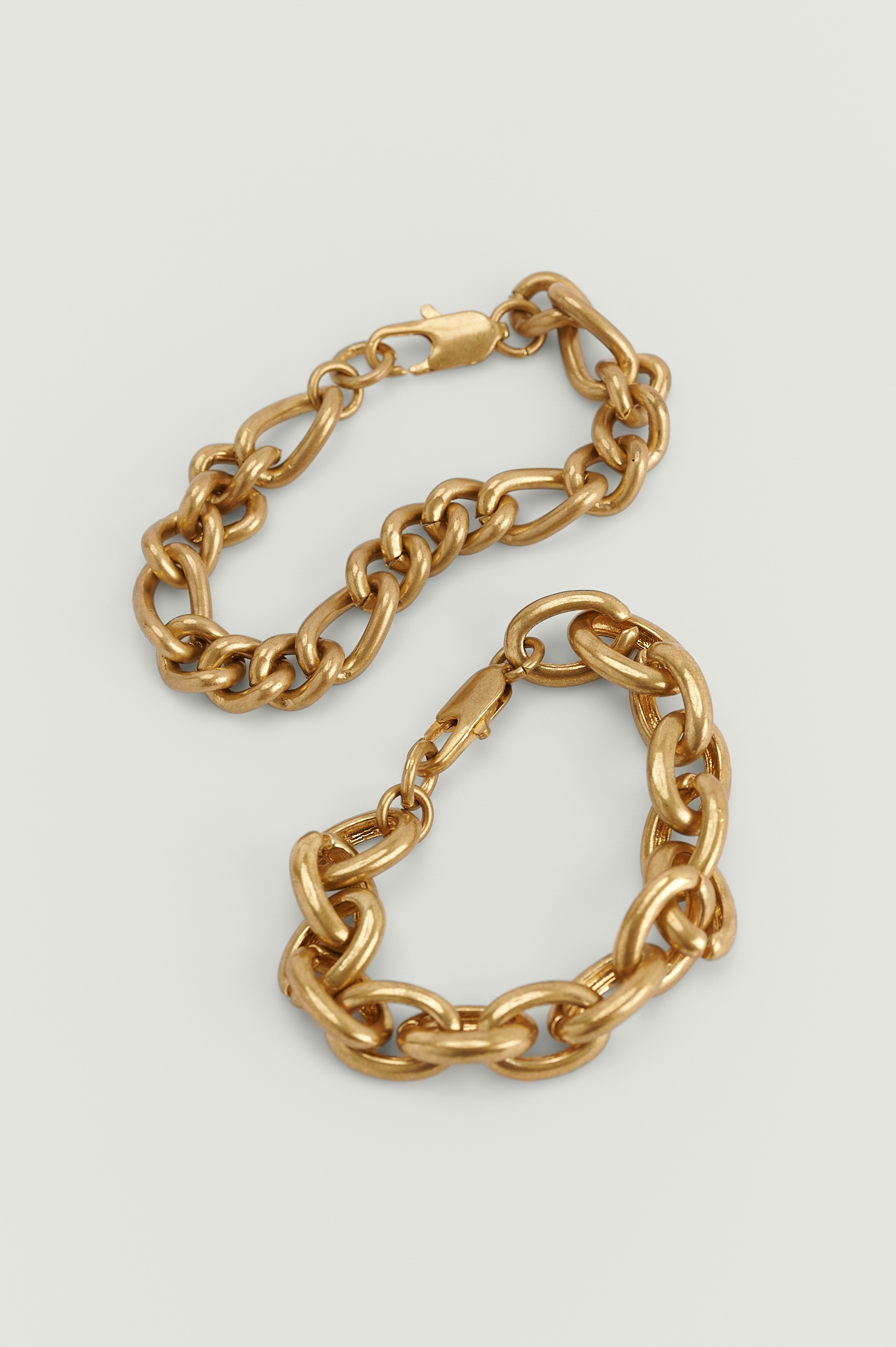 Gold Lot de deux bracelets épais dépolis