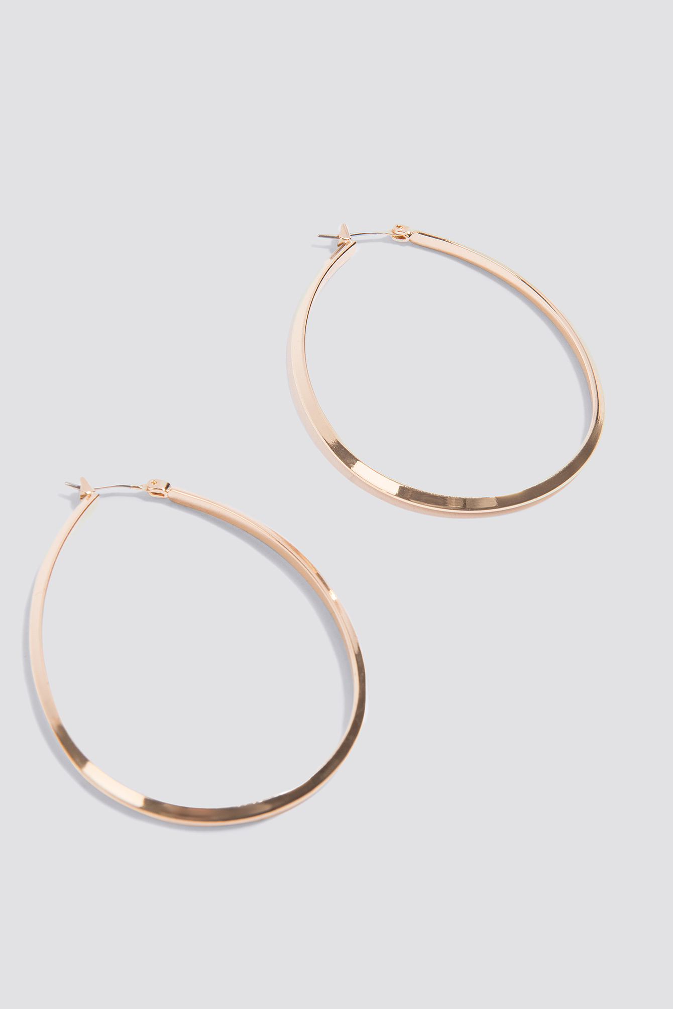 Gold Oval Structured Hoop Earrings