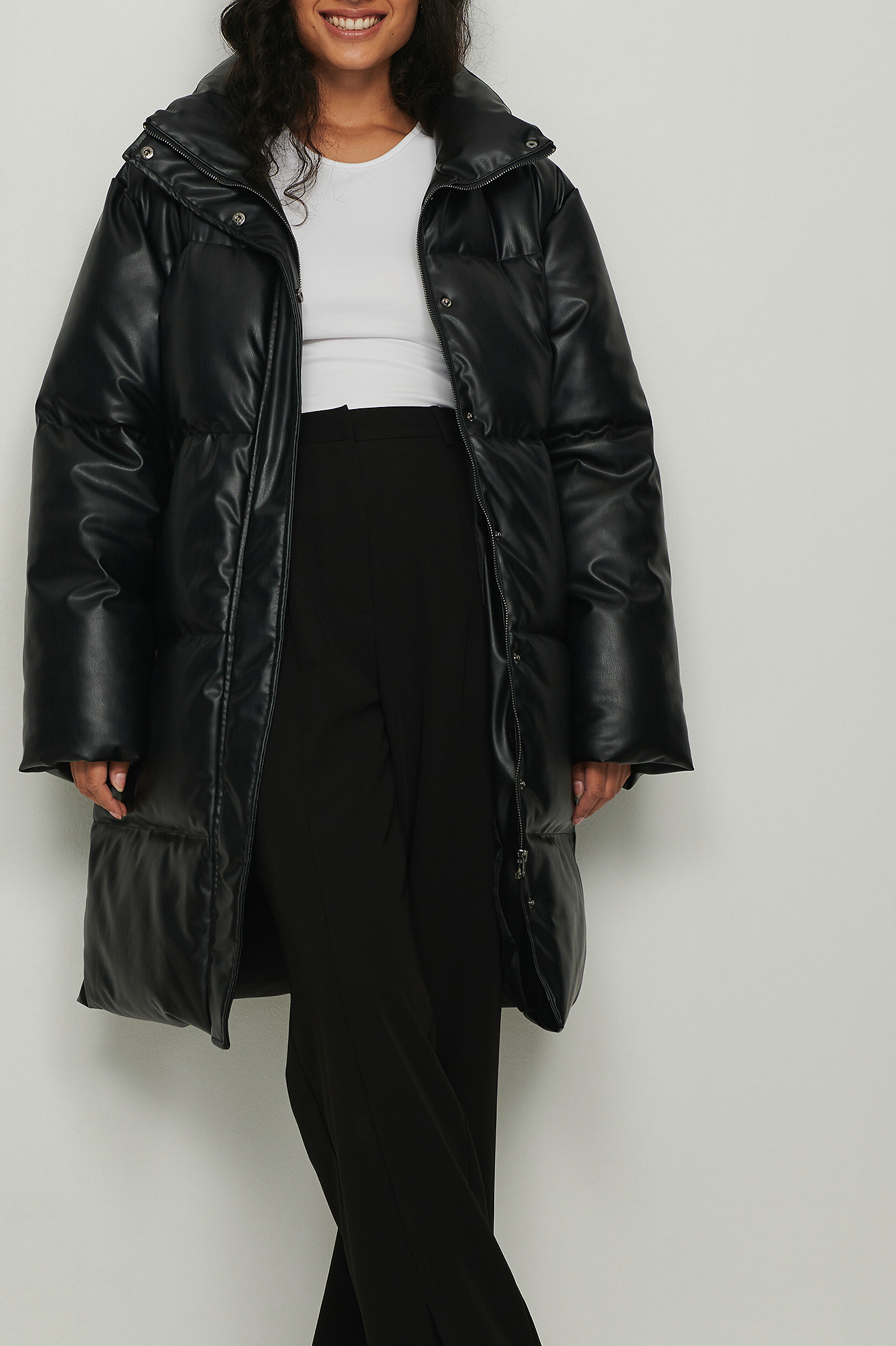 Black Recyclée veste longue matelassée en faux cuir