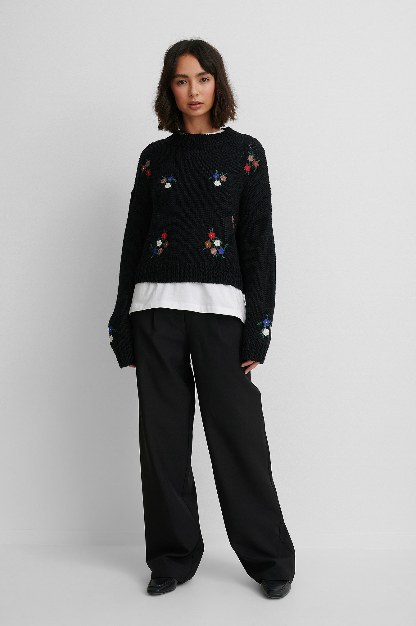Flower Embroidery Round Neck Knitted Sweater.