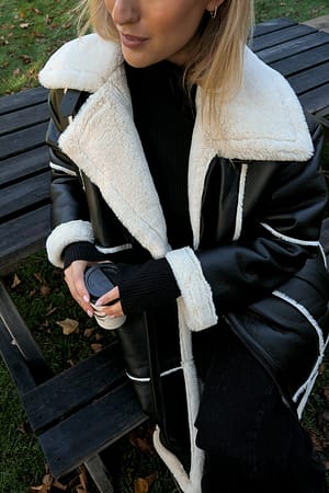 Black Veste en tissu contrecollé avec fausse fourrure
