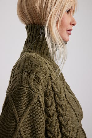 Burnt Olive Pull zippé en maille torsadée