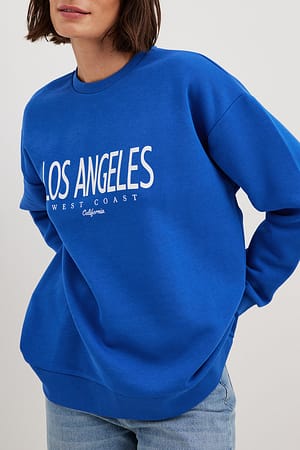 Blue Sweatshirt imprimé ville