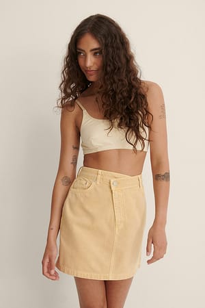 Dusty Yellow Jupe en jean à fermeture asymétrique colorée