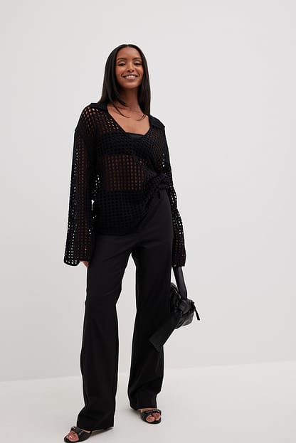 Black Pull en maille crochetée à col en V