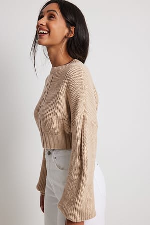 Light Beige Pull court en maille torsadée