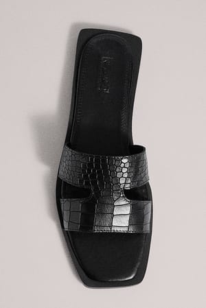 Black Chaussons en cuir à découpes