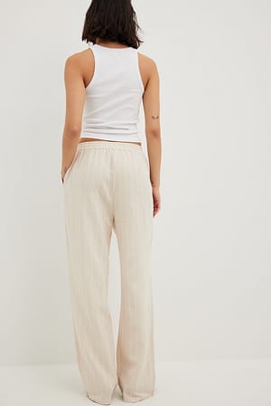 Offwhite Pantalon large à rayures et taille élastique