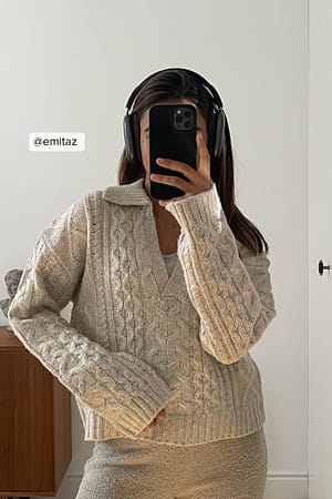 Beige Pull en maille torsadée