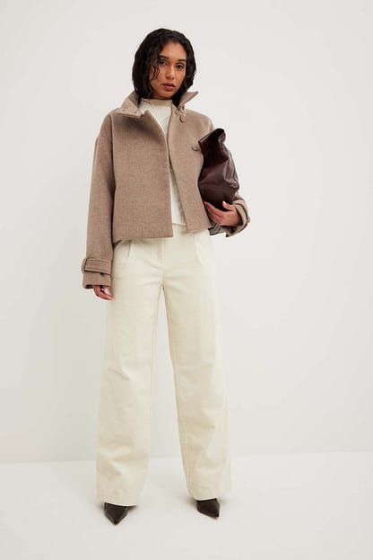 Offwhite Pull polo en maille côtelée col haut