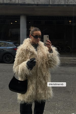 Offwhite Manteau fausse fourrure