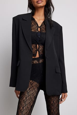 Black Gilet boutonné asymétrique en dentelle