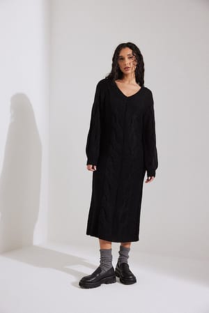 Black Robe mi-longue en maille torsadée