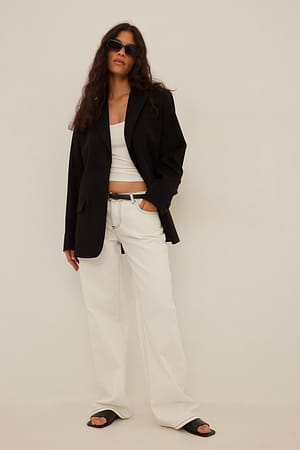 White Jean taille basse à coutures contrastantes