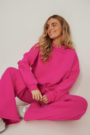 Fuchsia Sweatshirt à capuche court avec cordon de serrage