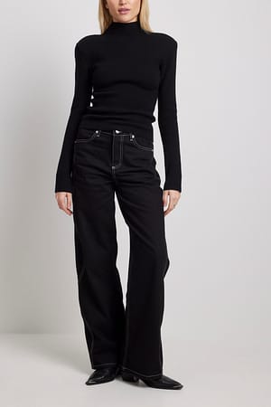 Black Jean à coutures contrastantes incurvées