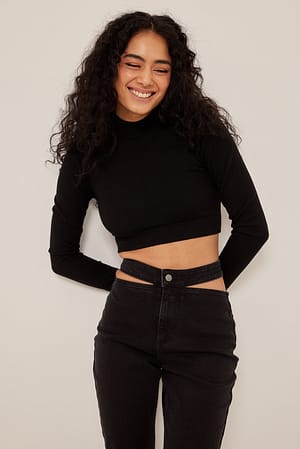 Washed Black Jean taille en V à découpes