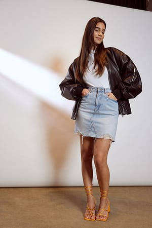 Light Blue Mini jupe en jean déchiré avec détails