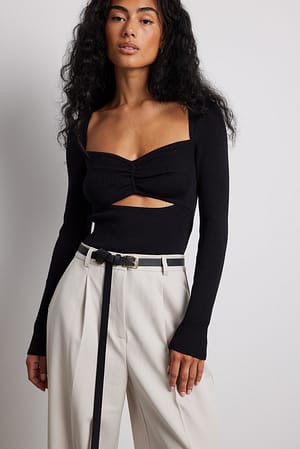 Black Haut en maille fine à découpes