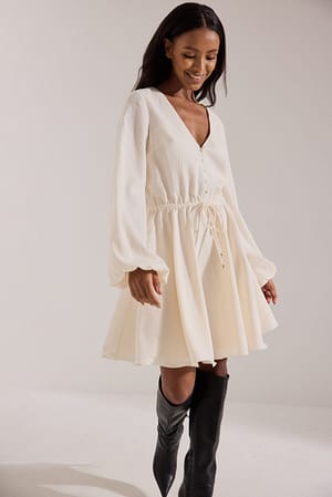 Off White Robe courte fluide à manches longues