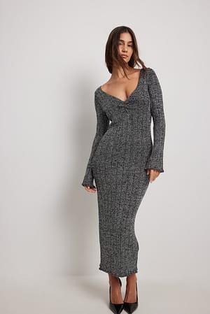 Black Robe longue pailletée en maille à col en V