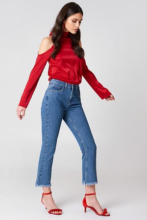 Mid Blue Raw Hem Flared Jeans