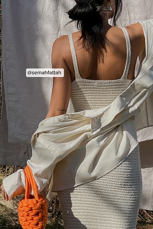 Offwhite Robe midi tricotée
