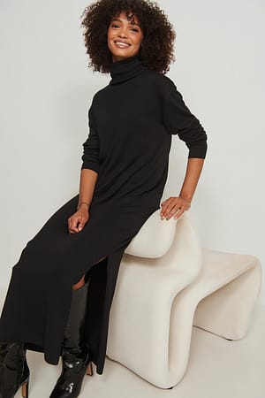 Black Robe longue fendue en tricot à col montant