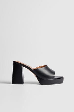 Black Mules à plateforme basse