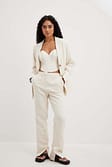 Offwhite Pantalon ajusté à taille mi-haute et fentes sur les côtés