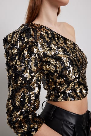 Leo Haut à paillettes à épaules bouffantes