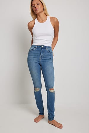 Mid Blue Jean slim taille haute déchiré