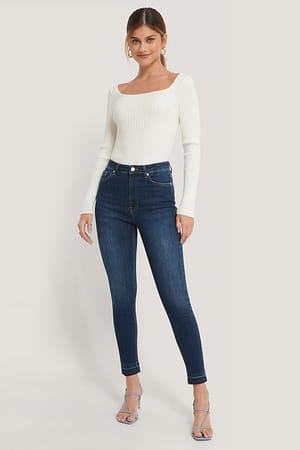 Dark Blue Jean slim taille haute à ourlet ouvert