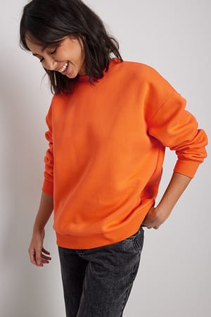 Orange Sweat surdimensionné