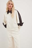 Off White/Brown Bomber en similicuir
