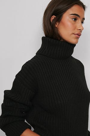 Black Pull à col roulé en tricot côtelé