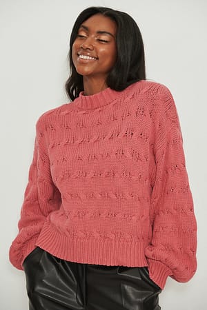 Pink Pull surdimensionné en tricot à col rond et ornements
