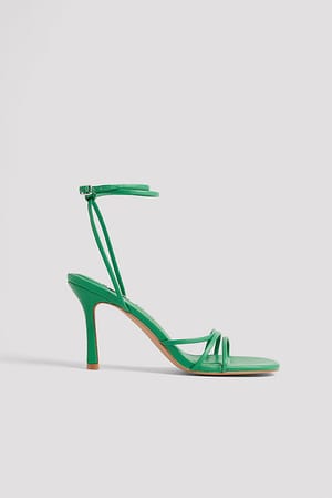 Strong Green Chaussures à talons à lanières bouts ronds
