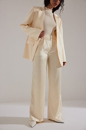 Off White Pantalon de costume en tissu satiné