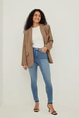 Mid Blue Jean slim taille haute à ourlet ouvert