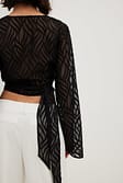 Black Blouse cache-cœur structurée à manches trompette
