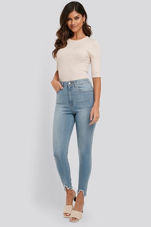 Light Blue NA-KD Super High Waist Asymmetrical Hem Jeans