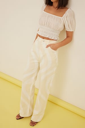 Beige Jean à détail spirale