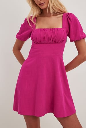 Pink Robe courte à manches bouffantes et dos noué