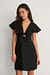 Robe chemise nouée sur le devant