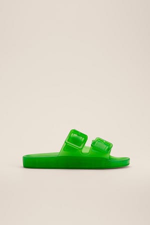 Strong Green Mules transparentes à boucle