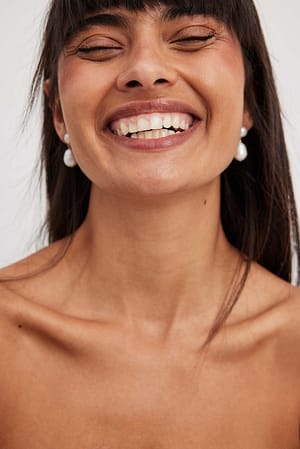 White Boucles d'oreilles en perles
