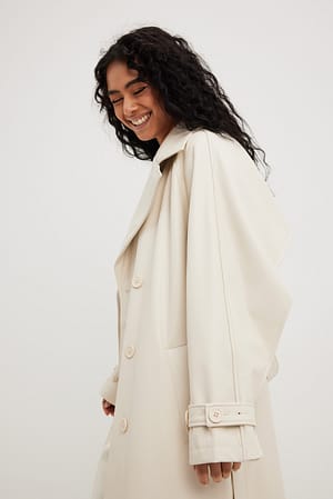 Offwhite Trench en similicuir