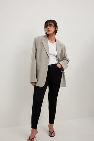 Black Jean slim taille haute à ourlet brut